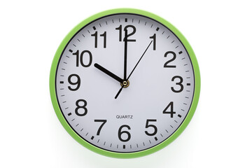 Ten o'clock. Wall clock showing time. Clipping path included. White background.
