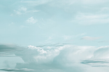 Green blue cloudy sky wallpaper with cool tones