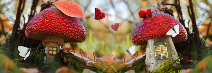 A magical, fantastic forest with tree branches on a blurry background. Fairy houses with Windows...