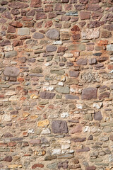 Pattern of bricks and stones at old middle age wall, Magdeburg, Germany