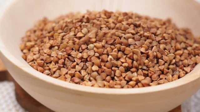 buckwheat macro view on rustic background. gluten free ancient grain for healthy diet, selective focus