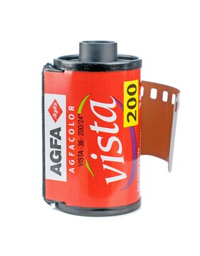 NIEDERSACHSEN, GERMANY JULY 20, 2019: A roll of AGFA Vista colour 35mm camera film standing on a white background