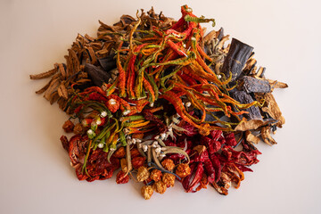 organic dried peppers, eggplant,  aubergine, chilli pepper, okra and tomato in natural light