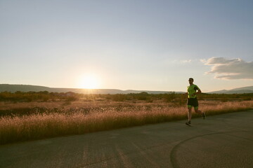 Obraz premium triathlon athlete running on morning trainig