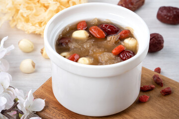 Close up of sweet snow white fungus soup with lotus seed, Chinese red dates and wolfberry.