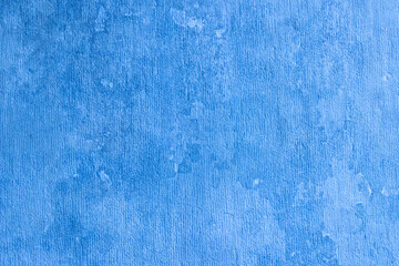 Rough uneven surface of the plastered wall.