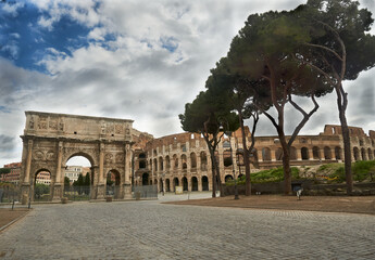 Colosseum and Arch of Contantine against a dramatic sky