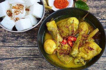 Opor ayam, chicken cooked in coconut milk from Indonesia, from Central Java, added with boiled...