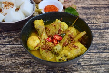 Opor ayam, chicken cooked in coconut milk from Indonesia, from Central Java, added with boiled...