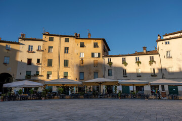 Piazza Anfiteatro in Lucca, Tuscany Italy on a sunny day