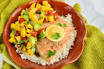 Baked salmon with coconut rice and mango salsa