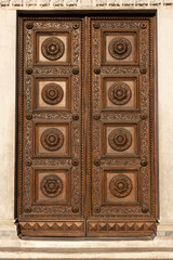 Old wooden door with vintage ornaments
