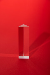 glass prism on red background