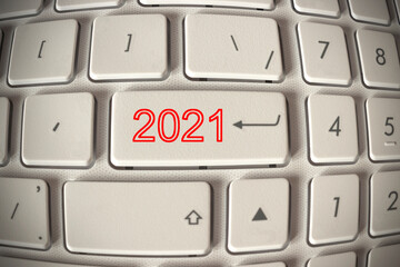 on the white keyboard a red button with the number 2021, the start of the new year