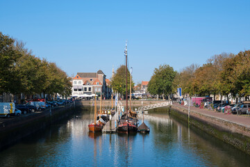 Fototapeta premium Medieval town Zierikzee in the province Zeeland in The Netherlands with it scenic old Dutch bridges and buildings is a favorite tourist destination for many Europeans