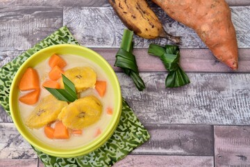 Indonesian Food - Kolak Pisang Ubi, Plantain banana and sweet potato, cooked in coconut milk, palm sugar and pandanus leaves