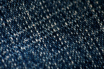 Jeans denim texture close up , focus only one point , soft blured background wallpaper