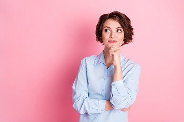 Portrait of her she nice attractive lovely creative brainy focused brown-haired girl creating solution overthinking copy space isolated over pink pastel color background