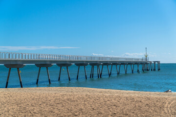 Obraz premium Badalona, Catalonia / Spain - October 3rd, 2020: The Petroleum Bridge as seen from below in a sunny day