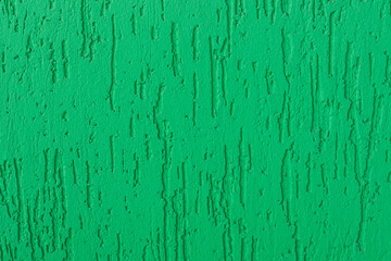 Green painted plaster wall background. Turquoise exterior finish surface. Creative wallpaper, website backdrop for design and text sign. Aqua color decorative texture.