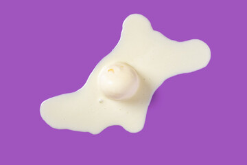 top view vanilla flavor ice cream ball in a melting process on purple background