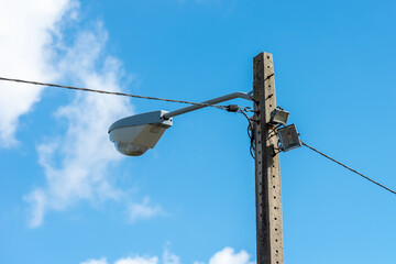 old lantern on a background of blue sky