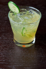 Cocktails. Traditional American drinks made by artisanal bartenders or mixologists in speakeasy & upscale bars or dives or taverns.Cocktails served in chilled cocktail glasses & garnished with fruit.