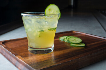 Cocktails. Traditional American drinks made by artisanal bartenders or mixologists in speakeasy & upscale bars or dives or taverns.Cocktails served in chilled cocktail glasses & garnished with fruit.