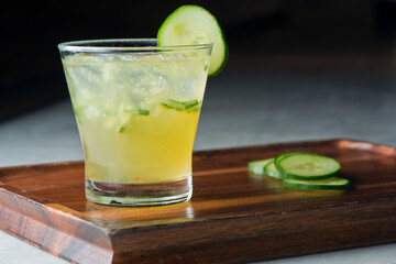 Cocktails. Traditional American drinks made by artisanal bartenders or mixologists in speakeasy & upscale bars or dives or taverns.Cocktails served in chilled cocktail glasses & garnished with fruit.