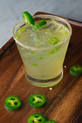 Cocktails. Traditional American drinks made by artisanal bartenders or mixologists in speakeasy & upscale bars or dives or taverns.Cocktails served in chilled cocktail glasses & garnished with fruit.