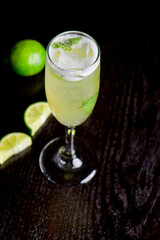 Cocktails. Traditional American drinks made by artisanal bartenders or mixologists in speakeasy & upscale bars or dives or taverns.Cocktails served in chilled cocktail glasses & garnished with fruit.