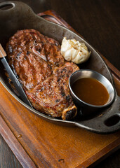 Steak. Bbq Steaks. Grade A grass fed angus beef steaks. Tenderloin, filet mignon, New York strip, bone in rib-eye grilled medium rare on wood-fired grill. Classic American steakhouse entree favorite.