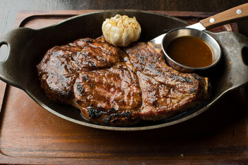 Steak. Bbq Steaks. Grade A grass fed angus beef steaks. Tenderloin, filet mignon, New York strip, bone in rib-eye grilled medium rare on wood-fired grill. Classic American steakhouse entree favorite.