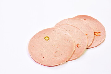 pork bologna stuffed chili on dish in white background