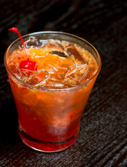 Cocktails. Traditional American drinks made by artisanal bartenders or mixologists in speakeasy & upscale bars or dives or taverns.Cocktails served in chilled cocktail glasses & garnished with fruit.