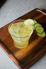 Margarita. Classic traditional Mexican cocktail. Made with Blanco tequila, fresh lime juice, agave syrup and orange juice. Served in salt rimmed tumbler over ice and garnished with a lime.