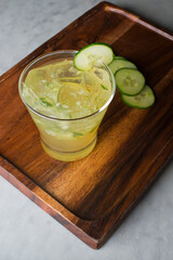 Margarita. Classic traditional Mexican cocktail. Made with Blanco tequila, fresh lime juice, agave syrup and orange juice. Served in salt rimmed tumbler over ice and garnished with a lime.