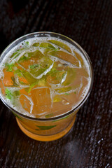 Margarita. Classic traditional Mexican cocktail. Made with Blanco tequila, fresh lime juice, agave syrup and orange juice. Served in salt rimmed tumbler over ice and garnished with a lime.