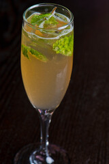 Margarita. Classic traditional Mexican cocktail. Made with Blanco tequila, fresh lime juice, agave syrup and orange juice. Served in salt rimmed tumbler over ice and garnished with a lime.