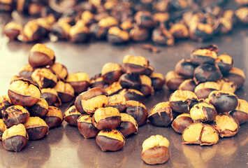 Close-up of fried chestnuts on the street of Istanbul, Turkey. Chestnut is traditional Turkish street food