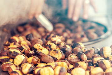 Close-up of fried chestnuts on the street of Istanbul, Turkey. Chestnut is traditional Turkish street food