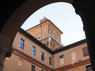 Ferrara castle, Italy. Arch and tower.