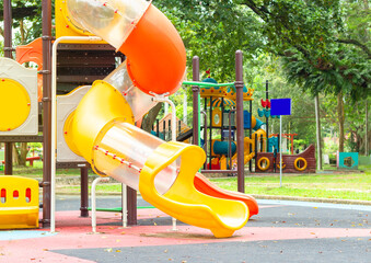 Close up outdoor colorful slider and play equipment at Playground at public park