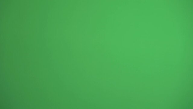 Gestures pack. Male hand in medical gloves touching, clicking, tapping, sliding, dragging and swiping on chroma key green screen background. Alpha Channel. Using a smartphone, tablet pc or a