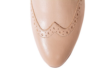 Woman beige leather shoes with low heel isolated on the white background. Top view