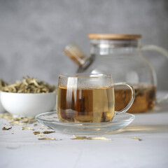tea dry white silver needles is on the table	