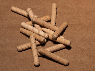 Spiraled wooden dowel pegs
