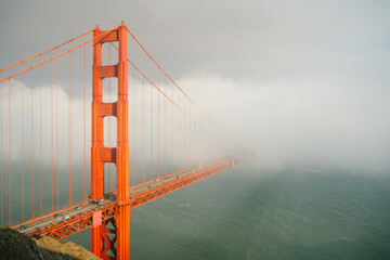 golden gate bridge in fog © Carl Newton