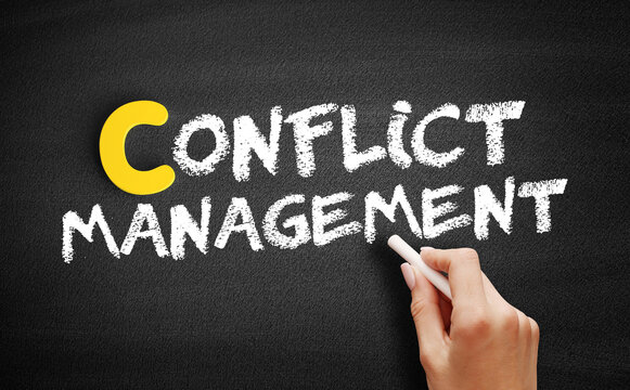 Conflict management text on blackboard, concept background