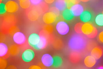 Christmas light background. Holiday glowing backdrop. Defocused Background With Blinking Stars. Blurred Bokeh.